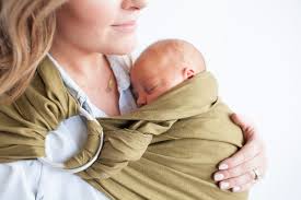 Want to learn how to use a ring sling? Wildbird Ring Sling Review Pregnancy Newborn