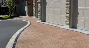 When compared to the edges of a concrete driveway, the edges of an asphalt driveway look very different. Enhancing Your Asphalt Driveway With Paver Borders Unilock