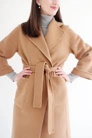 Stop for a moment and consider the camel coat. The Curated Classic Camel Coat Review