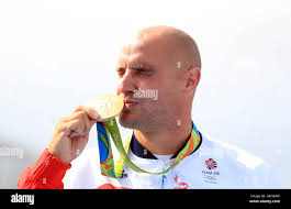 Der Brite Liam Heath nach seiner Goldmedaille bei den Herren K1 200 m am  fünfzehnten Tag der Olympischen Spiele in Rio, Brasilien Stockfotografie