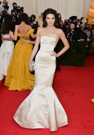 While kendall jenner opted for a chic suit, kim decided to rock skintight latex. Every Kardashian Met Gala Look Ever Ranked Red Carpet Paper