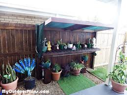 This bench is outfitted with a dry sink, tool storage and plenty of shelving. 65 Diy Potting Bench Plans Completely Free Epic Gardening