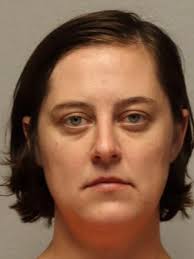 Iron Range woman charged with burning down father's house