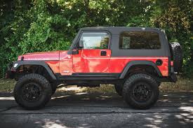Image result for Flame Red 2006 Jeep