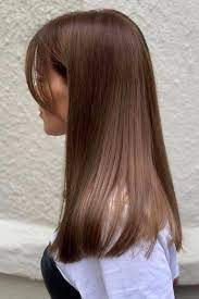 For a night out, curl a few random pieces to add soft, feminine touches. Straight Hair With Bangs