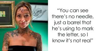 Image result for quirky pylon forehead tattoo