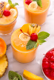 Combine tropical fruit, yogurt, pineapple juice, banana and strawberries in blender or food processor container. Tropical Smoothie Baker By Nature