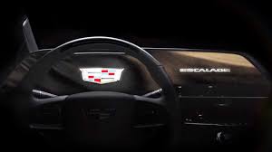 Although cadillac retained the organic feel of the old. Cadillac Escalade Interior Teaser Shows Large Oled Curved Display