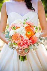 Having a beach wedding and looking for stunning coral colored flowers. Coral And White Bridal Bouquet