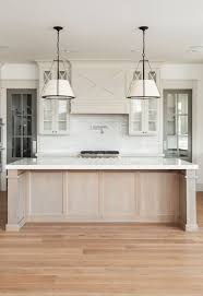 A rustic kitchen with oak cabinetry can be enhanced by the ambient lighting. White Oak Kitchen Cabinets Online Instaimage