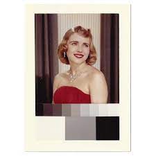 For many years, this shirley card — named for the original model, who was an employee of kodak — was used by photo labs to calibrate skin tones, shadows and light during the printing process. Kodak Shirley S Nn