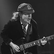Ac/dc guitarist angus young may be one of the unlikeliest guitar heroes in rock music, simply for the fact that he's not trying to be a guitar hero at all. Angus Young Marshall Com