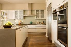 Cabinet ideas a light wood floor and white subway tile backsplash will help brighten the room while allowing gray cabinets to become the centerpiece of the design. Stylish And Elegant Frameless Cabinets In Contemporary Kitchen Designs