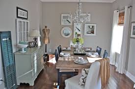 How pretty is this entire room from honey we are home? Sherwin Williams Anew Gray For A Shabby Chic Style Dining Room With A Mirror Collage And Cottage Chic By Ally Whalen Design Homeandlivingdecor Com