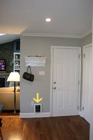 Finding A Spot For The Kitty Litter Is Never An Easy Task Our Basement And Laundry Room Are Accessed Through A Door Home Hiding Cat Litter Box Cat Litter Box