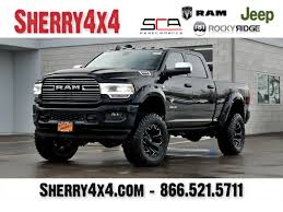 The female spider hangs upside down from her web as she waits for her prey. Lifted 2019 Ram 2500 Sca Performance Black Widow 29513t Sherry 4x4