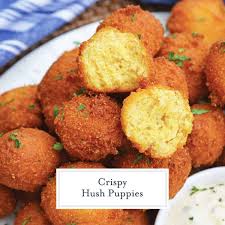 296 calories per 100g of hush puppies amount to 15% of a daily intake of 2000 calories, but your daily values may be higher or lower depending on your calorie needs. Easy Southern Hush Puppies Recipe Fried Cornbread In 30 Minutes