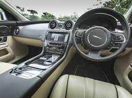7.5 the 2017 jaguar xj, like all super luxury cars, offers elegant styling and quality materials inside. 2015 Jaguar Xj 2 0 Litre Petrol Interior Photo Gallery Zigwheels