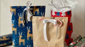 Come learn how to make gift bags from wrapping paper! How To Make Gift Bags Out Of Wrapping Paper Scraps Youtube