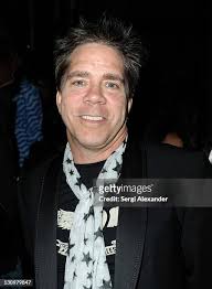 Singer Ruben Campbell performs at the Red Dress Fashion Show during... News  Photo