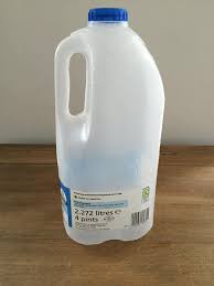 Craft punch (small drill or awl) cording. Indoor Bottle Herb Garden From Recycled Milk Bottles Grillo Designs