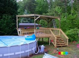 Swimming Pool Pool Decks Spectacular Intex Ultra Frame Pool With Deck For Above Ground Swimming Pool Deck Ideas Ingroun Pool Decks Pool Landscaping Simple Pool