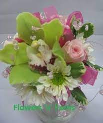 All photos feature prom flowers designed by the staff at the house of flowers. Prom Flowers This Is A Clutch Bouquet Perfect For A Spring Prom Flower Delivery Prom Flowers Funeral Flowers
