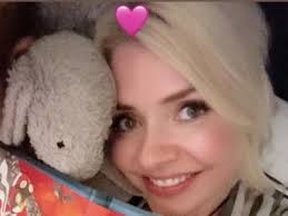 This Morning's Holly Willoughby supports Dermot O'Leary as she's seen  cosying up in bed