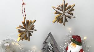 Décorations de noël à faire soi même pour l extérieur. Tuto Etoile De Noel En Carton Momes Net