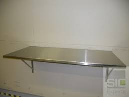 It can even be used outdoors as a serving area while entertaining, then simply fold it flat and store it away. Stainless Steel Wall Mounted Folding Table Sic29541 Sic Experts