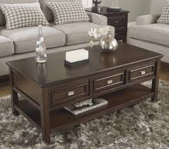 Larimer Rectangular Cocktail Table By Signature Design By Ashley Coffee Table Coffee Table With Drawers Furniture