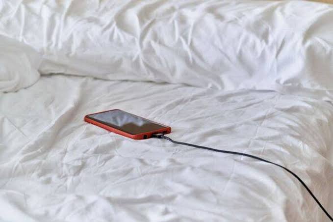 Experts issue safety warning over charging phones in bed - Nottingham Post