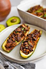 Cut zucchini in half, and scoop out the insides (repurpose for another dish). Vegan Trick Soundofliberation Com