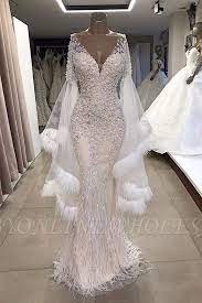 We carry dresses in sumptuous fabrics like chiffon and satin that wear like a dream. Luxurious Mermaid V Neck Long Sleeves Crystal Floor Length Prom Dresses With Tassels Beading Evening Gowns Prom Dresses Long With Sleeves Prom Dresses With Sleeves Bridal Dresses