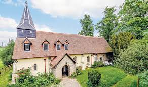 The church's architectural details like high ceilings and stained glass windows have remained while the interior was done in white color scheme with wooden flooring. Old Chapels And Historic Churches Can Be Converted Into Heavenly Homes Express Co Uk