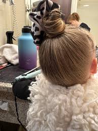 When love bug asks for lots of braids and a bun mom does her best