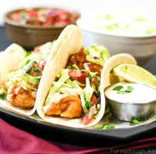 In a small dish, stir together seasonings: Fish Tacos Tornadough Alli