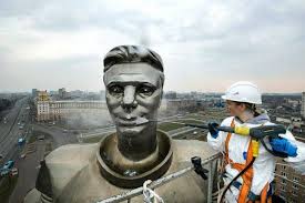 Statue of yuri gagarin (en); A Worker Cleans The Statue Of Yuri Gagarin