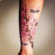 Cherry Blossom Branch With Kids Names Tattoos And Piercings Tattoos Tattoo Placement