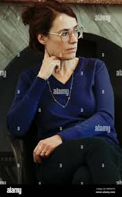 Berlin, Germany. 16th Sep, 2019. Regina Schilling, documentary filmmaker,  follows the conversation "Of expectations and disappointments" at Schloss  Bellevue. The event was part of the discussion series "Geteilte  Geschichte(n)". Credit: Carsten Koall ...