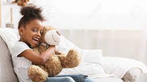 Home interiors homco 12 ceramic miniature international bear figurines 1406 homeinteriorshomco. Cute Black Girl Hugging Teddy Bear Home Interior Childhood Concept Panorama With Copy Space Stock Photo Picture And Royalty Free Image Image 138657100