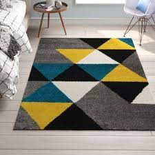 12 Popular Bathroom Paint Colors Our Editors Swear By Better Homes Gardens Yellow Area Rugs Grey And Yellow Living Room Yellow Grey Rug