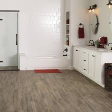 Sometimes it can feel like the main bathroom is busier than grand central station, with kids washing off messes, pets getting a bath, and everything in between. Faux Bois Tile For New Upstairs Bathroom Home Depot Lifeproof Sierra Wood 6 In X 24 In Porcelain Floor And W Flooring Porcelain Flooring Wood Tile Bathroom