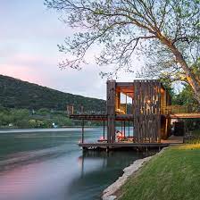 There's no question that building a boat dock will take time, but it can be accomplished. Andersson Wise Assembles New And Salvaged Materials Into Rustic Austin Boathouse