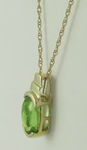 14 karat yellow gold 17 inch 5 sideways cross necklace. Buff Top Peridot Pendant In 14k Gold Gp 3005