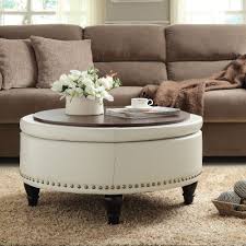 It can also function neatly as a coffee table, using a wooden try or reversible cushion top. Ottoman Coffee Table Round