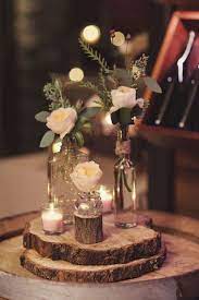 Old Glasses Candles And Wooden Slice Used For Wedding Centerpieces Weddingcandlesdesign Rustic Wedding Centerpieces Wedding Centerpieces Wedding Table