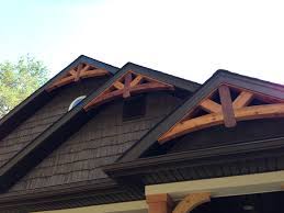 Joinery is used for the king post, queen posts, and wings with mortise and tenon domino connectors, hidden lag screws and exterior grade glue for additional durability. Cedar Gable Bracket Details Are Truly Craftsman Style At Its Best Craftsman Style Homes Craftsman House Craftsman Exterior