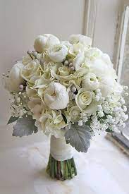 Wedding flowers/bouquets sweet pea colours with pearl loop sprays. 42 Beautiful Wedding Bouquets That Are Unique Wedding Forward Flower Bouquet Wedding Winter Wedding Flowers Wedding Bouquets