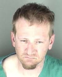 Kan. felon captured after crash in stolen car